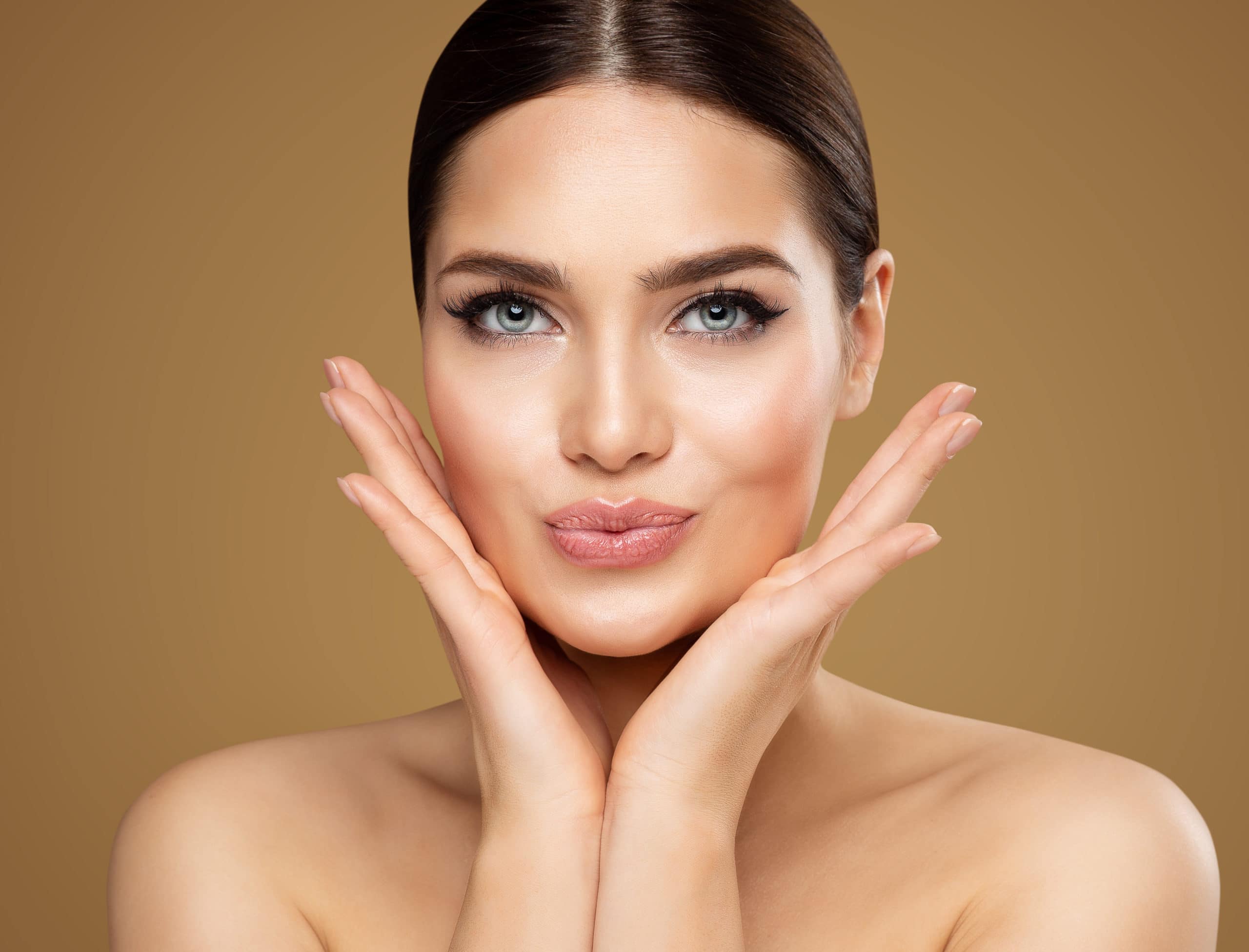 Beauty Model showing Cheekbones and Full Lips. Beautiful Woman Face Skin Care. Women Dermal Filler and Permanent Make up Cosmetology. Lip Augmentation Facial Lifting Spa Massage | Adam J Cohen, MD in Glenview & Chicago, IL